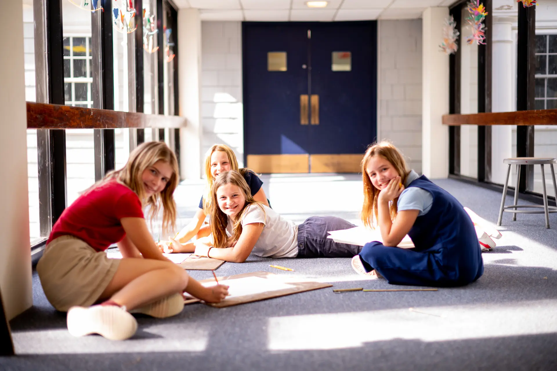 Kent School children studying in the hallway together