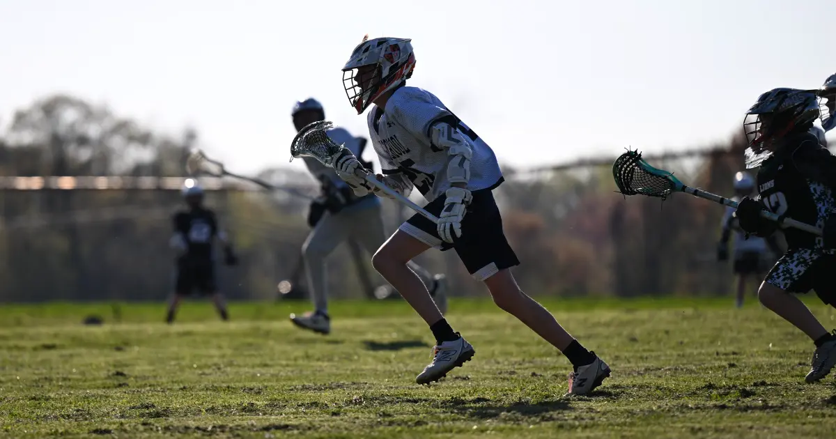 Kent School students playing lacrosse